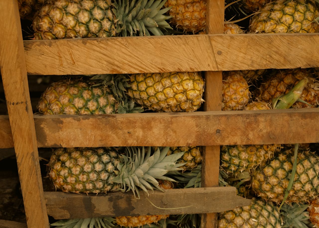 Agricultural produce safely packed for transport using durable wooden crates